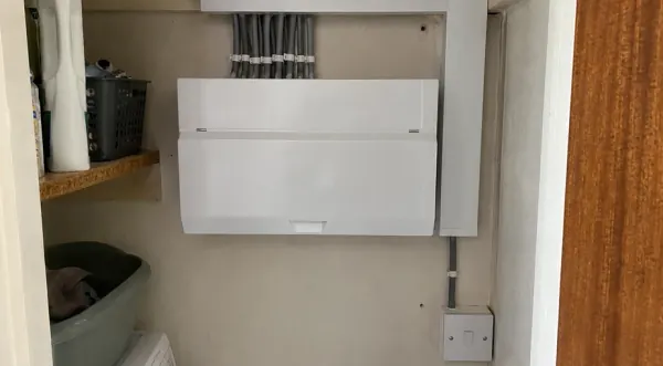 Domestic consumer unit in a utility cupboard