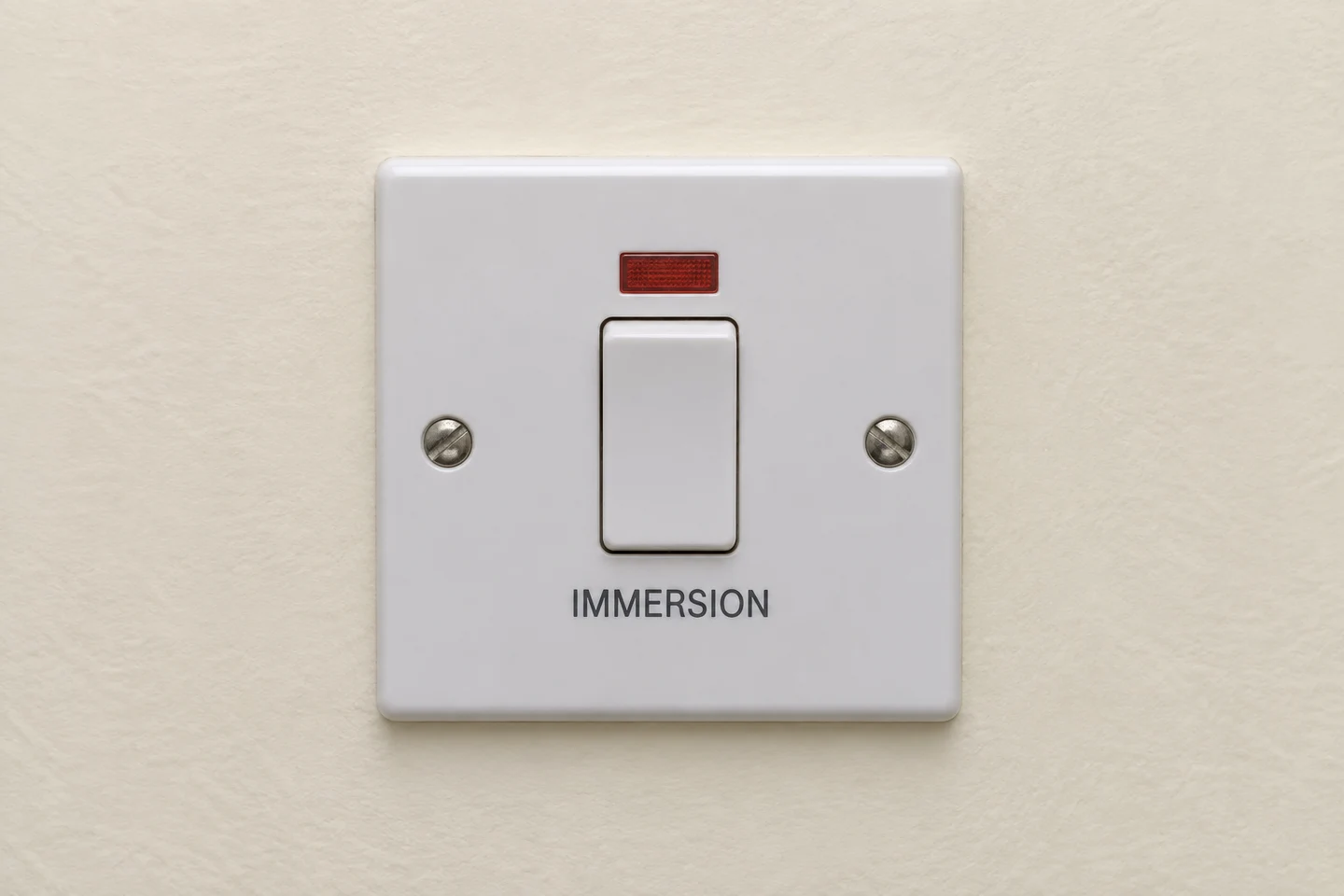 immersion heater isolator switch in a cylinder cupboard
